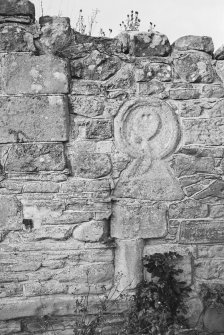Detail of carved stones incorporated into wall of Lennel Old Parish Church.