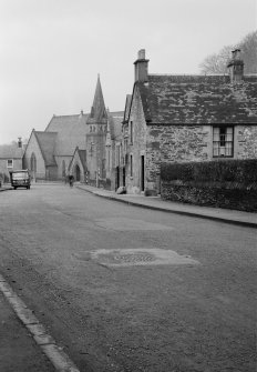 General view of High Street, Dunblane from south east showing Balhaldie House and St Blane's Church.