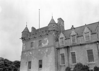 View of upper part of tower from south, Udny Castle.
