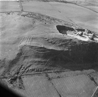 Oblique aerial view centred on the remains of Kaimes Hill fort.