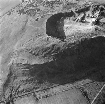 Oblique aerial view centred on the remains of Kaimes Hill fort.