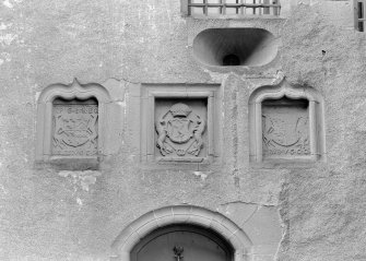 View of heraldic panels in courtyard, Craig Castle.