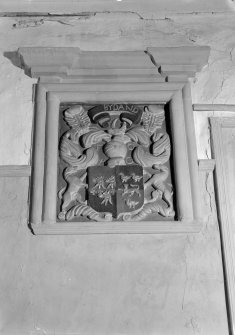 Interior view of Craig Castle showing detail of coat of arms in Great Hall.