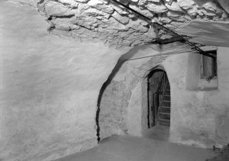 Interior view of Corsindae House showing vaulted cellar.