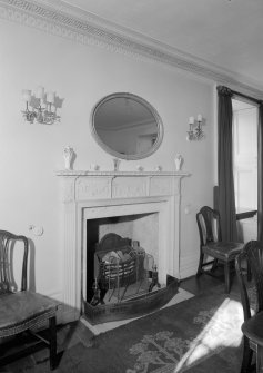 Interior view of Corsindae House showing detail of fireplace in dining room.