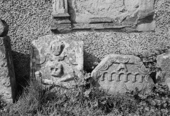 View of headstones in the churchyard of Eckford Parish Church.