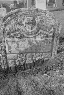View of sunken gravestone dated 1777, in the churchyard of Auchtergaven Parish Church, Bankfoot.