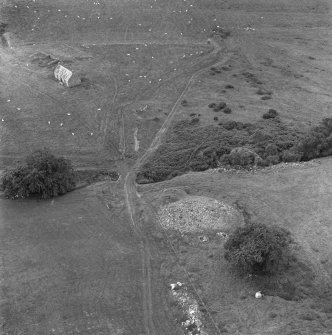 Oblique aerial view centred on Red Burn chambered cairn.
