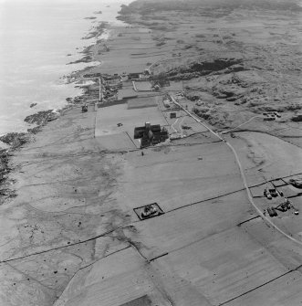 Oblique aerial view of Iona Abbey and Baile Mor villlage from N.