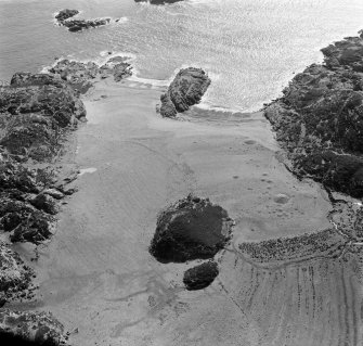 Oblique aerial view of Port an Fhir-Bhreige, Iona.