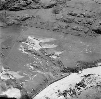 Oblique aerial view of cultivation remains and farmstead, Traigh Na Criche, Iona.