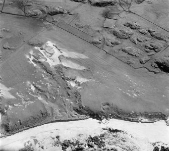 Oblique aerial view of cultivation remains and farmstead, Traigh Na Criche, Iona.