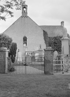 General view of Kiltearn Parish Church and gates to churchyard.