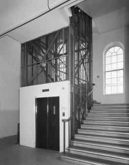 Interior. View of lift shaft and stairwell.