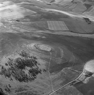 Oblique aerial view centred on the remains of the fort at White Caterthun.