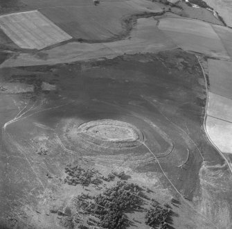 Oblique aerial view centred on the remains of the fort at White Caterthun.