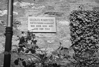 Detail of plaque on cottage in Inver Village.
The plaque is inscribed; 'Charles MacIntosh. The "Perthshire Naturalist" was born here 1839 and died 1922'.