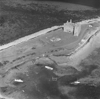 Oblique aerial view centred on Lochranza Castle, Arran.