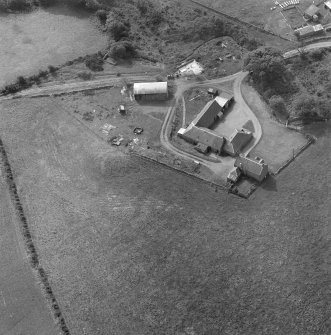 Oblique aerial view of the site of St Patrick's Chapel, Kilpatrick, Arran.
