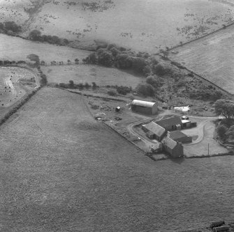 Oblique aerial view of the site of St Patrick's Chapel, Kilpatrick, Arran.