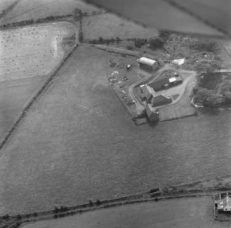 Oblique aerial view of the site of St Patrick's Chapel, Kilpatrick, Arran.
