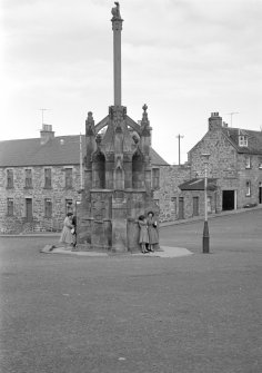 View of the Mercat Cross, The Square, Cullen from S.