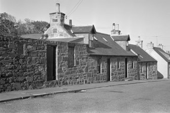 General view of 22, 24 and 26 South Deskford Street, Cullen from E.