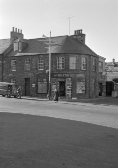 View of 7-9 The Square, Cullen from N, showing McBeath's chemist and stationer shop.