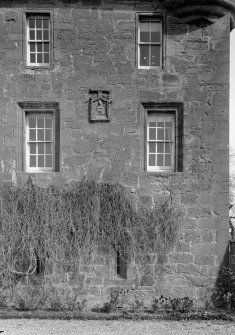 Detail of Gardyne Castle from SW showing windows and armorial panel.