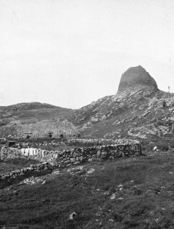 View of broch from east.  Blackhouse is partially visible. Copied from a photograph album of M Curle,1931-5.