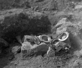 Traprain treasure as found 12 May 1919. From photograph album of the Curle family, 1911-19.