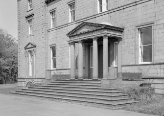 View of portico on south elevation, Cairness House from the side.