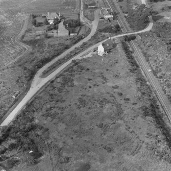 Oblique aerial view of agricultural landscape at Balblair and Edderton Station.