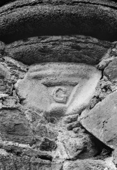 Detail of carved stone showing initial 'G', Terpersie Castle.