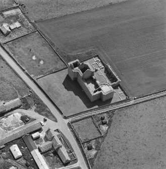 Oblique aerial view centred on the ruins of Noltland Castle, Westray.