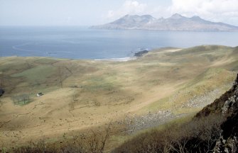 Eigg, Howlin. General view of Howlin from SE with Rum in the background.