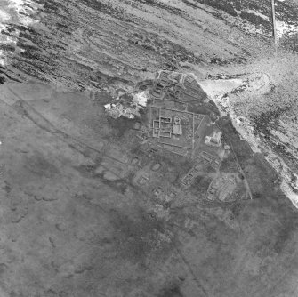 Oblique aerial view of the chapel and settlement at Brough of Birsay.
