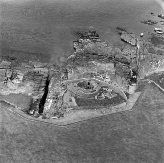 Oblique aerial view of Midhowe broch, Rousay.