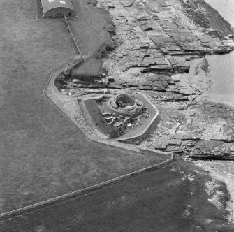 Oblique aerial view of Midhowe broch, Rousay.