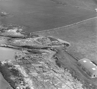 Oblique aerial view of Midhowe broch, Rousay.