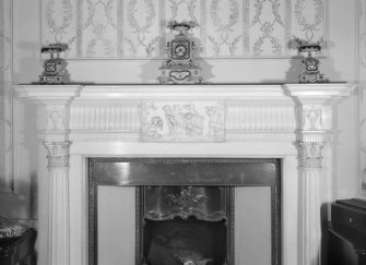 Interior view of Cessnock Castle showing fireplace in drawing room.
