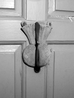 Detail of door knocker to main door.