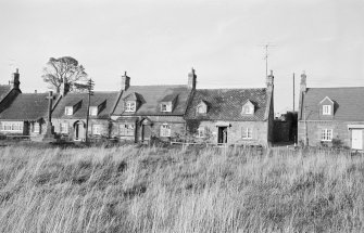 View of houses in Foulden village from SW.