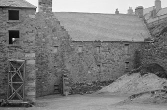 View of west section of warehouse at 10 Shorehead, Portsoy.