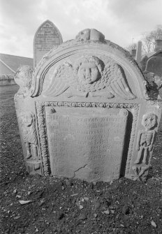 View of gravestone commemorating the Kinnimount children 1748, Inchture Church.