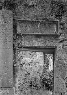 Detail of entrance doorway and inscription in S wall of main block, Glencorse Old Parish Church.