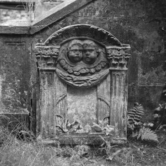 View of gravestone to James Craigie 1713 in the churchyard of Glencorse Old Parish Church.