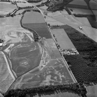 Oblique aerial view of Finavon Roman temporary camp and Haughs of Finavon.
