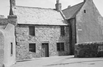 General view of 88 Church Street and gable end of 84 and 86 Church Street, Portsoy.