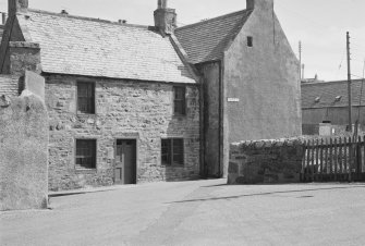 General view of 88 Church Street and gable end of 84 and 86 Church Street, Portsoy.